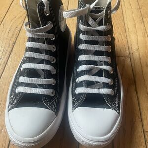 Converse Black and White High-Top Sneakers